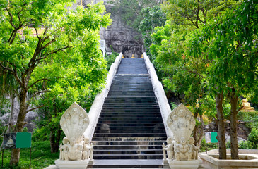 Fototapeta na wymiar Gate entrance with naga staircase for people walking go to praying and visit Lord Buddha image line appearing