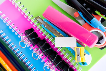 Selective focus multi colored office supplies and stationery