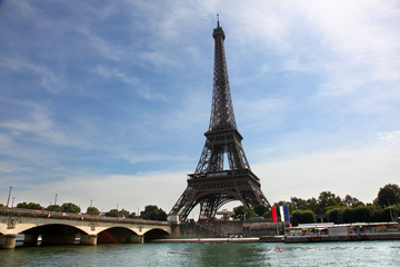 Fototapeta na wymiar View of Eiffel Tower and Pont d Lena across the River Seine