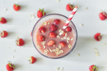 Strawberry smoothies with banana and oatmeal (top view)