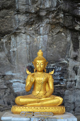 Old golden buddha statue at Wat Phra Phutthachai in Saraburi, Thailand