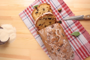 Cupcake with raisins knife and wooden spoon