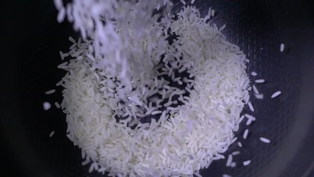 Rice grains falling