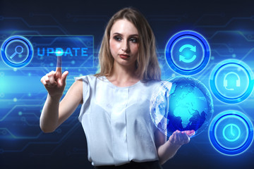 The concept of business, technology, the Internet and the network. A young entrepreneur working on a virtual screen of the future and sees the inscription: Update