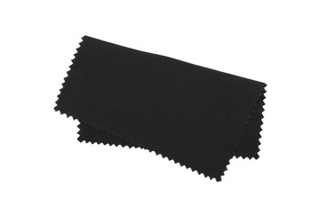 Crumpled black microfiber cloth isolated on white background
