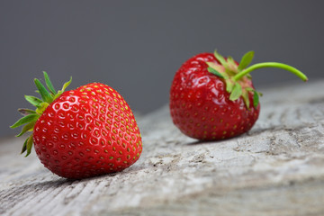 strawberries on the brown wooden table