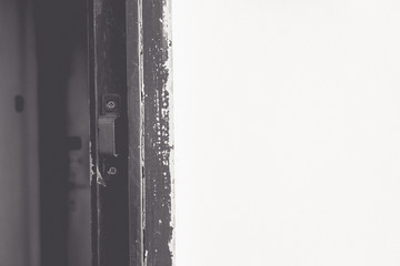 Black and white of the place where the door lock enters