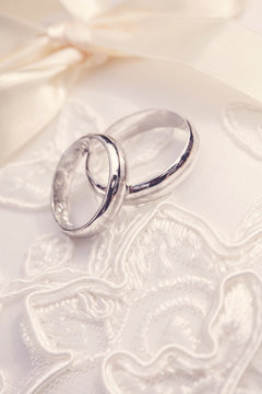 Wedding rings on beautiful background