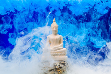 Buddha in the white smoke.