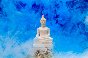 Buddha in the white smoke.