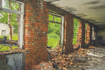 Abandoned interior in ruins of military settlement.