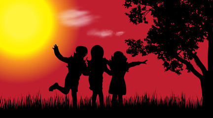 Vector silhouette of children in nature at sunset.