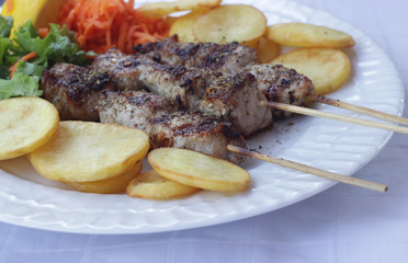 Grilled meat skewers