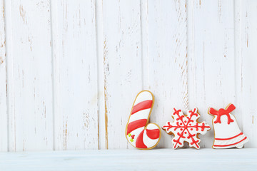 Christmas cookies on a white wall paneling background