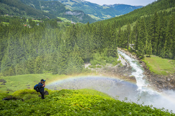 photographe/cascade de Krimml avec arc en ciel