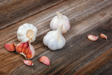 Fresh garlic on a wooden background