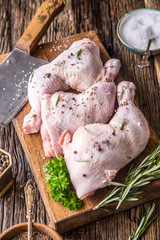 Chicken legs. Raw chicken legs with salt pepper and herbs. © weyo