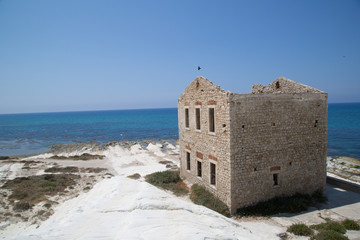 Old mediterranean stone house on the coast