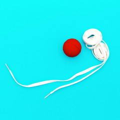 Shoelaces and soccer ball. Play. Minimal art.