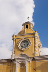 Santa Catalina Arch & ruins in Spanish colonial town & UNESCO World Heritage Site and clouds.
