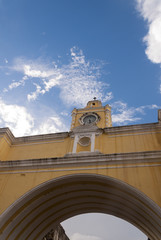 Santa Catalina Arch & ruins in Spanish colonial town & UNESCO World Heritage Site and clouds.
