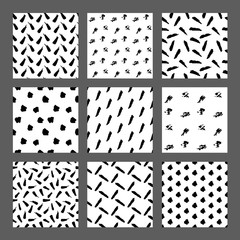 Hand drawn ink seamless pattern set. Simple Vector backgrounds with dots, stripes, lines, waves, hearts, scratches.