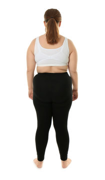 Back view of overweight woman on white background