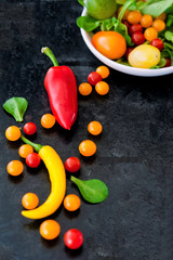Decorative types of peppers and tomatoes of different colors
