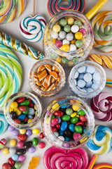 Fototapeta na wymiar Colorful gum sweet candy and lollipops and gum balls