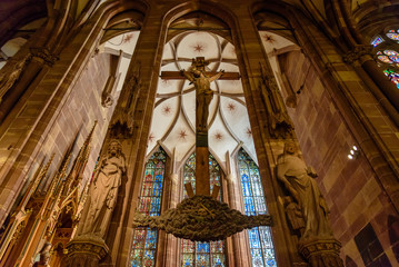 Naklejka premium The interiors of the gothic cathedral of Strasbourg, France.