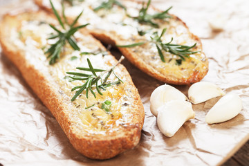 Garlic bread with butter and rosemary