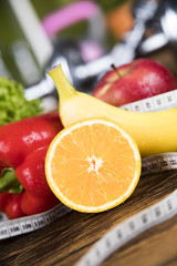 Sport, fitness, dumbbell and diet concept 