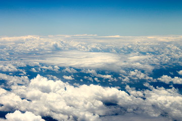 Fototapeta na wymiar cloudscape taken from above from airplane