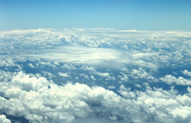 Fototapeta na wymiar cloudscape taken from above from airplane