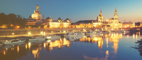 Fototapeta na wymiar Evening panorama of Dresden, Saxony, Germanyin retro styling