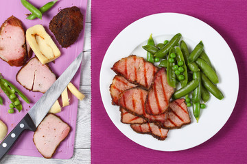 grilled meat and cooked green pea pods