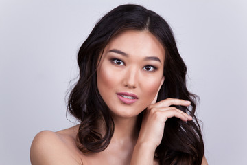 Fototapeta premium Portrait of a beautiful asian woman with naked shoulders.