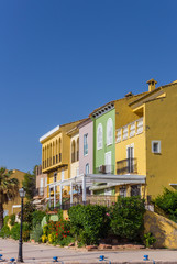 Fototapeta na wymiar Colorful houses of Port Saplaya in Valencia
