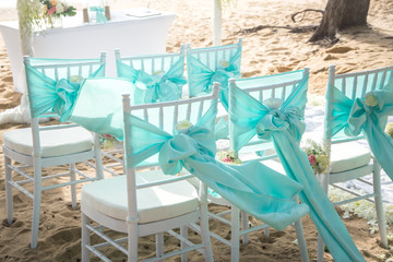 Wedding chair decorated with flowers and