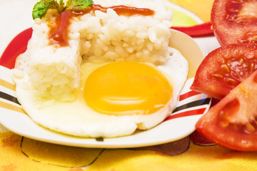 Eggs with rice and tomato