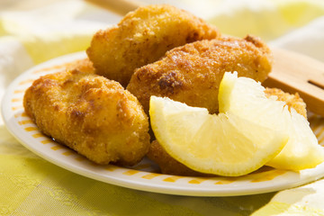 Plate of croquettes stuffed with lemon