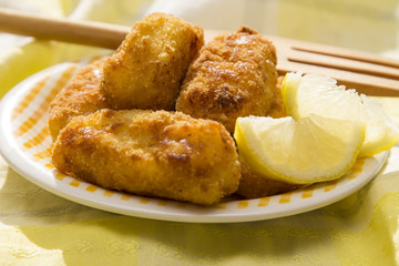 Plate of croquettes stuffed with lemon