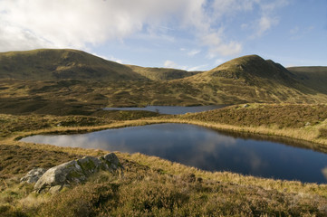 Fototapeta premium Hoggs Well looking towards Lock Skene above the Grey Mares Tail