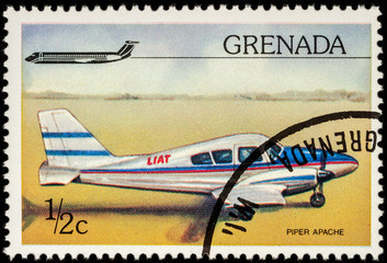 American small aircraft Piper Apache on postage stamp