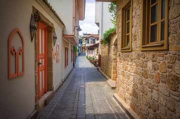 Fototapeta na wymiar A view of the narrow streets of the old town of Kalechi in Antalya, Turkey.