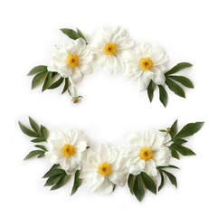 Floral frame with white peonies, leaves and buds isolated on white background. Flat lay, top view. Mother`s day concept.