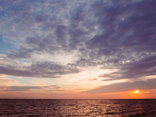 Sunset sky and cloud at the beach, sky background.