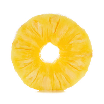A cut slice of pineapple fruit isolated on white background