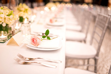 Table setting at a luxury wedding and Beautiful flowers on the table.