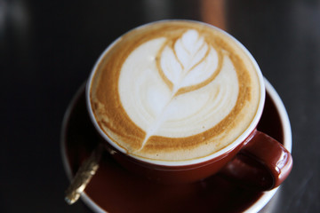 cappuccino coffee on dark background